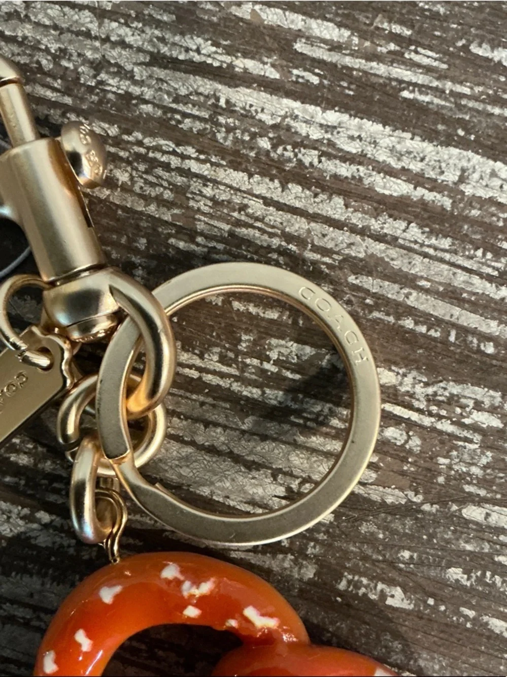Coach Orange Pretzel Charm Keyring/Bag charm with Gold Hardware. Dusty Included